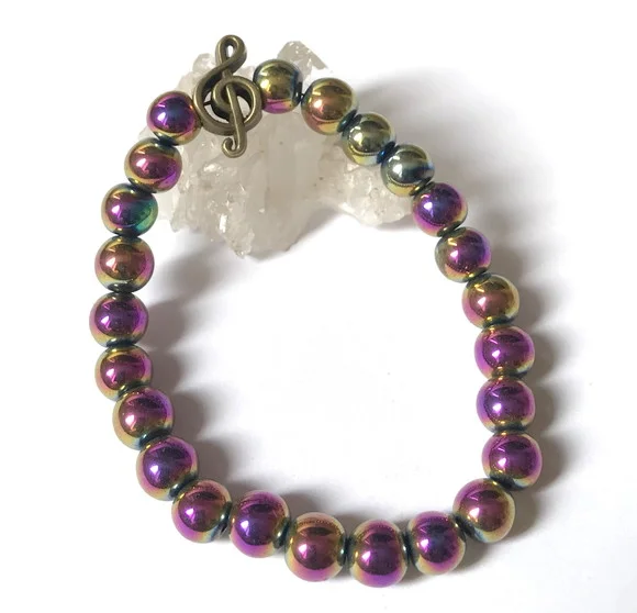 Pulseira com Hematitas Iridisadas e Clave de Sol Musica