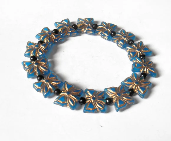Pulseira borboletas Theca azul com dourado