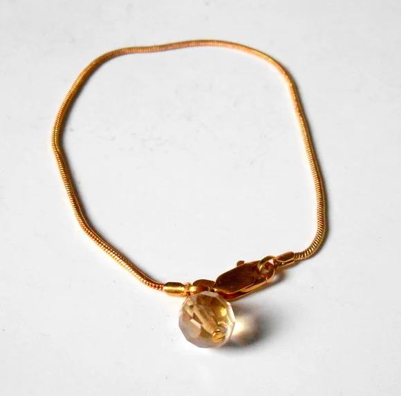 Pulseira folheada a ouro com cristal Theco