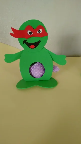 Tartaruga ninja porta bombom